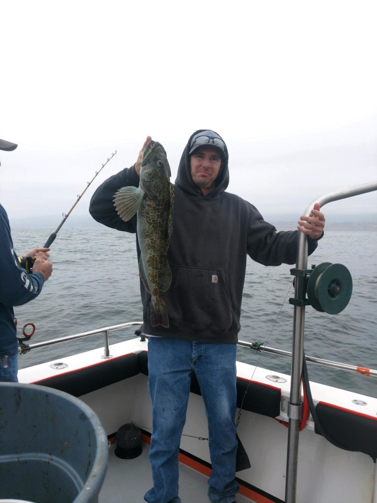 Reese with a nice ling cod from the morning trip. 