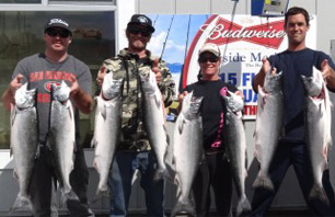 Men With Catch After Fishing Trip